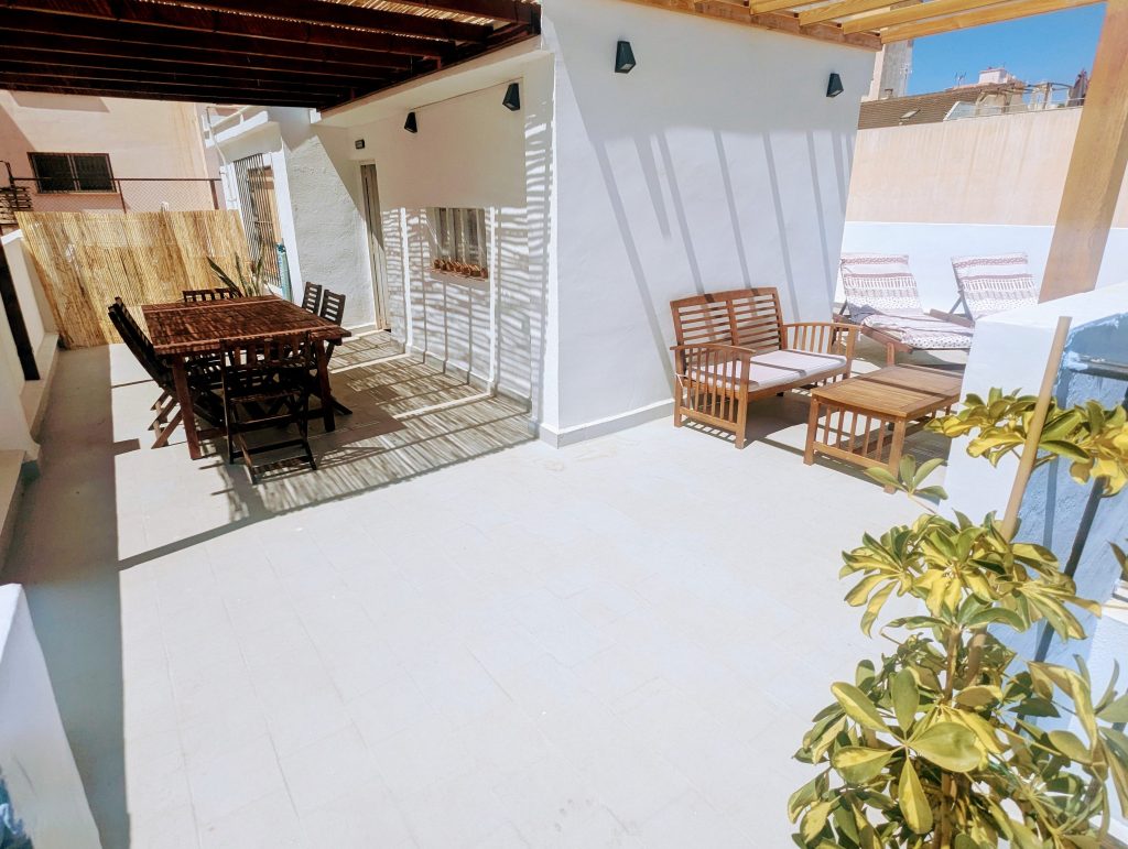 Rooftop terrace at SunFlow Coliving in Málaga